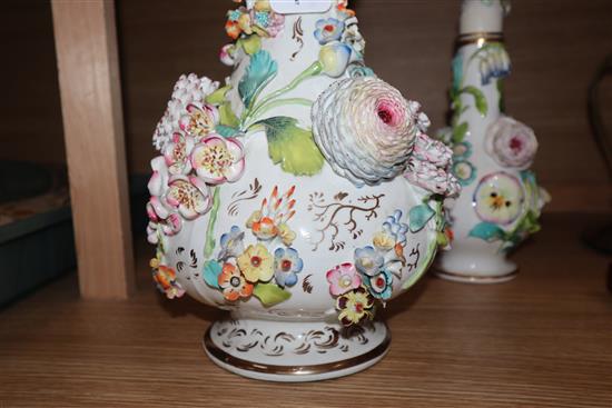 Three English porcelain flower encrusted scent bottles and covers, c. 1830-40, possibly Coalbrookdale, H. 41cm and 28cm